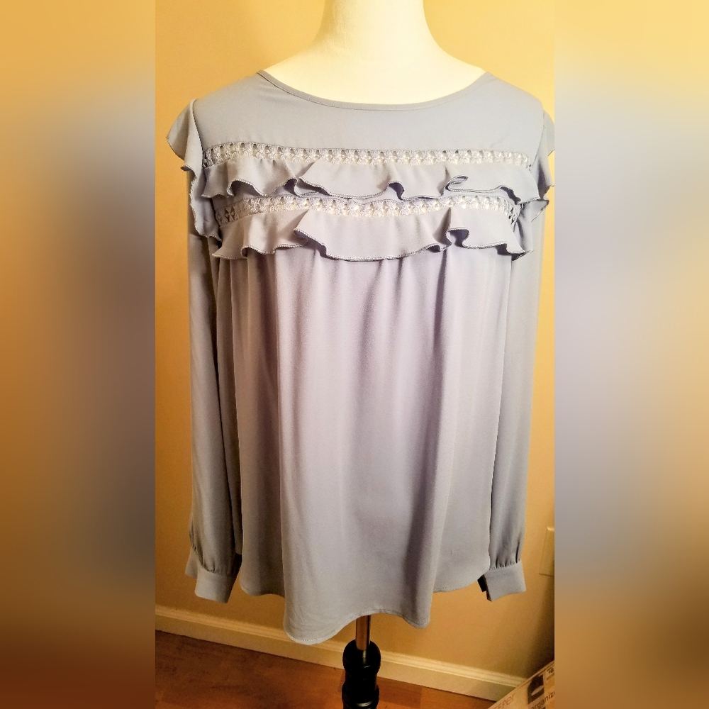 Ruffle cutout flowy blouse